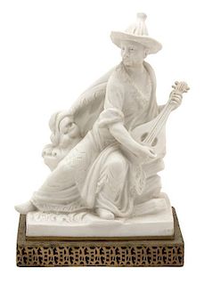 A Continental Bisque Porcelain Figure of an Asian Musician Height 14 inches.