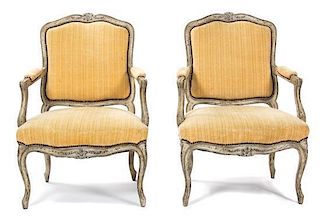 A Pair of Louis XV Style Fauteuils Height 36 1/2 inches.