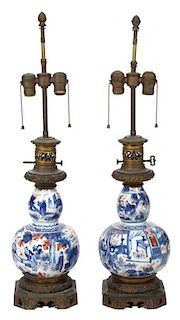 A Pair of Chinese Blue and White Porcelain Vases Height 30 inches.