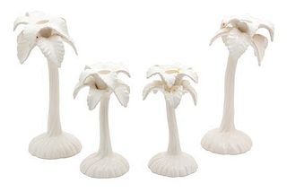 A Group of Four Palm Tree-Form Porcelain Candlesticks Height 10 inches.