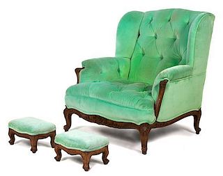 A Louis XV Style Carved Wood and Green Velvet Upholstered Wingback Chair Height 39 x width 36 1/2 inches.