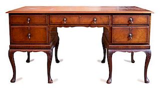 A George II Style Inlaid Mahogany Desk Height 30 x width 58 x depth 32 inches.