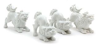 A Group of Four Porcelain Foo Dogs Height 4 3/4 inches.