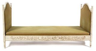 A Louis XVI Style Upholstered Daybed Height 39 x width 77 inches.
