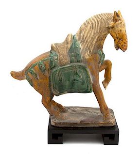 A Tang Style Sancai Glazed Horse Height 14 inches.