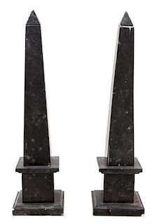 A Pair of Black Marble Obelisks Height 20 inches.
