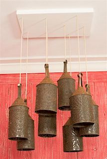 A Pair of Eight-Light Pierced Metal Lantern Style Chandeliers Width 30 inches.