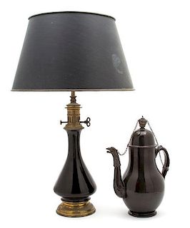 A Tole and Brass Table Lamp Height of lamp 21 inches.