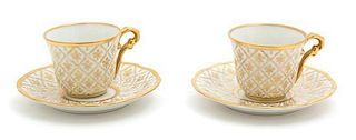 A Set of Twelve Porcelain Demitasse Cups and Undertrays Diameter of saucer 4 1/2 inches.