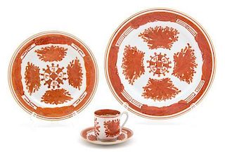 A Collection of Japanese Orange and White Porcelain Dishes Diameter of largest plate 10 1/3 inches.
