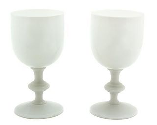 A Set of Twelve Milk Glass Water Goblets Height 6 1/2 inches.