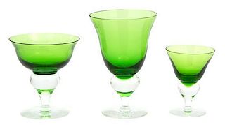 A Collection of Green Molded Glass Stemware Height of largest 7 inches.