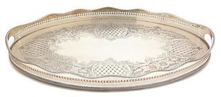 Two English Regency Style Silver-on-Copper Pierced Gallery Serving Trays Width of largest 24 1/2 inches.