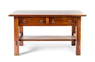 An American Arts & Crafts Oak Library Table, Paine Furniture, Height 30 x width 54 x depth 31 7/8 inches.