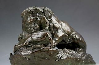 Bronze figure Lion devouring a boar signed by