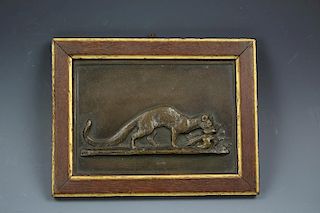 Bronze Genet dragging a bird, bas-relief signed by