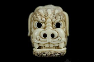 Vintage Netsuke carving of a foo lion with movable jaw