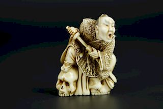 Vintage Netsuke carving of a Samurai