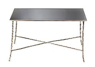 A Silvered Metal Low Table, in the manner of Maison Bagues, Height 18 1/2 x width 32 1/8 x depth 19 1/2 inches.