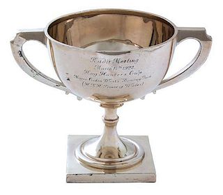 An Indian Silver Race Cup, Circa 1922, on a square pedestal base, the otherwise plain hemispherical bowl engraved with an ins