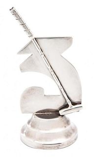 A Colombian Silver Polo Prize Ornament, (20th Century), modeled as a stylized 3 with a polo mallet on a circular stepped base