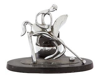 A Chromed Metal Polo Player-Form Ronson Cigarette Lighter Stand Height 4 1/2 x width 5 1/8 x depth 4 inches.