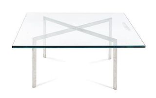 A Ludwig Mies van der Rohe Stainless Steel Barcelona Low Table, German (1886-1969), Height 16 3/4 x width 40 x depth 40 inches.