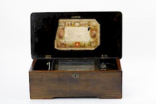 A wonderful vintage mechanical music box with 10 songs