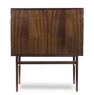 A Danish Mahogany Cabinet, Ole Wanscher (1903-1985), Height 55 1/4 x width 47 1/4 x depth 15 7/8 inches.