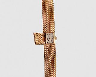 MOVADO and GRANT A. PEACOCK 14K Yellow Gold Covered Wristwatch