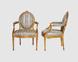 Pair of George III Carved Giltwood Armchairs, late 18th century