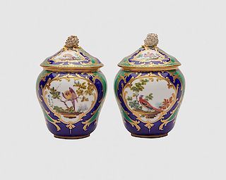 Pair of English Porcelain Cobalt and Apple Green Ground Bird-Decorated Covered Pots, 19th century