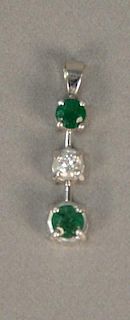 14K white gold emerald and diamond pendant.
