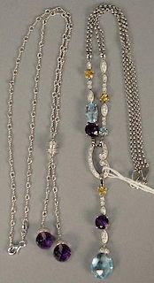 Two piece lot 14K white gold faceted amethyst necklace and 14K white gold multi-stone designer necklace.