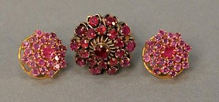 Pair of 14K gold ruby earrings and a ruby and gold ring.