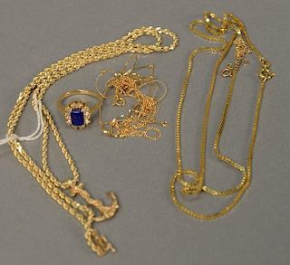 Six piece lot with 14K gold chain having anchor pendant along with four gold chains and a ring set with lapis and diamond, 26
