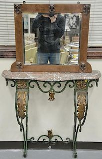 Two piece lot to include iron demilume table having a marble top along with a hand hammered mirror with ram's head. table: ht