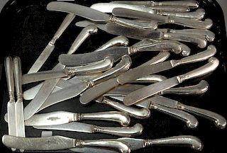 Thirty J. Ireland silver handled dinner knives and butter knives.