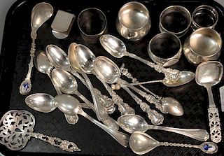 Tray lot of sterling to include napkin rings, spoons, serving spoons. 17.82 t oz.
