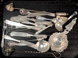 Lot of silver including figural tea strainer, spoons, forks, butter knives, and tongs marked Mary Dickinson Hoffman 1923 Caro