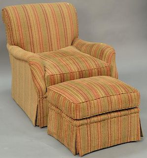 Custom upholstered easy chair and ottoman attributed to J. Robert Scott with copper staples.