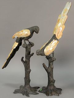 Pair of Maitland Smith Verdi bronze and mother of pearl parrots, these birds stand tall on tree stump bases with mother of pe