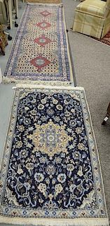 Two Oriental rugs, including a runner 3' x 9'6" and a scatter rug 2'10" x 4'8"