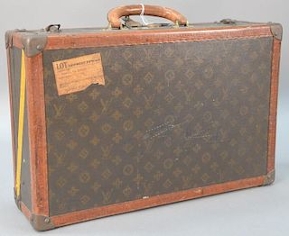 Louis Vuitton suitcase with label inside Louis Vuitton, initialed MDH 79545. ht. 5 3/4in., wd. 20in., dp. 13in.
