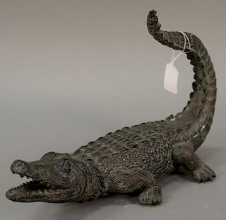 Bronze alligator or crocodile with its tail up. ht. 9in., lg. 14in.