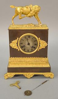 French Empire gilt bronze clock, 19th century having horse finial scratch his face, bronze mounts Mark Rox and Works mark FC 