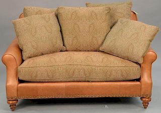 Grange leather loveseat with cloth upholstered cushions, made exclusively for Grange. ht. 36in., wd. 59in.