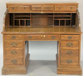 Ethan Allen contemporary oak roll top desk. ht. 48 1/2in., wd. 55in., dp. 28in.