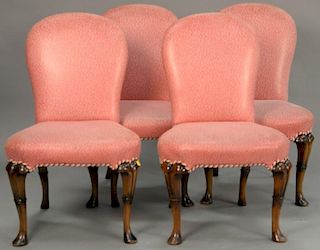 Set of four custom upholstered Queen Anne style side chairs.