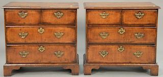 Pair of inlaid diminutive two over two drawer chests. ht. 30in., wd. 31 1/2in.